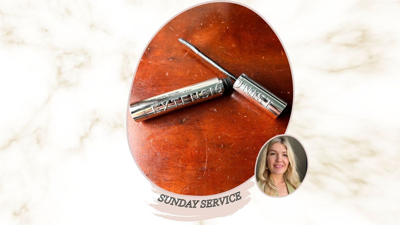 A marble backdrop with an image of loreal extensionist mascara on a wooden desk, beside an image of beauty editor Fiona McKim smiling with blonde hair