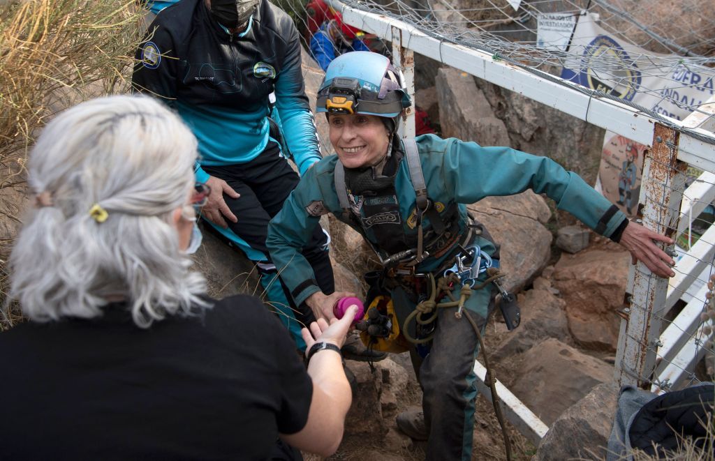 Spanish sportswoman Beatriz Flamini leaves a cave in Los Gauchos.