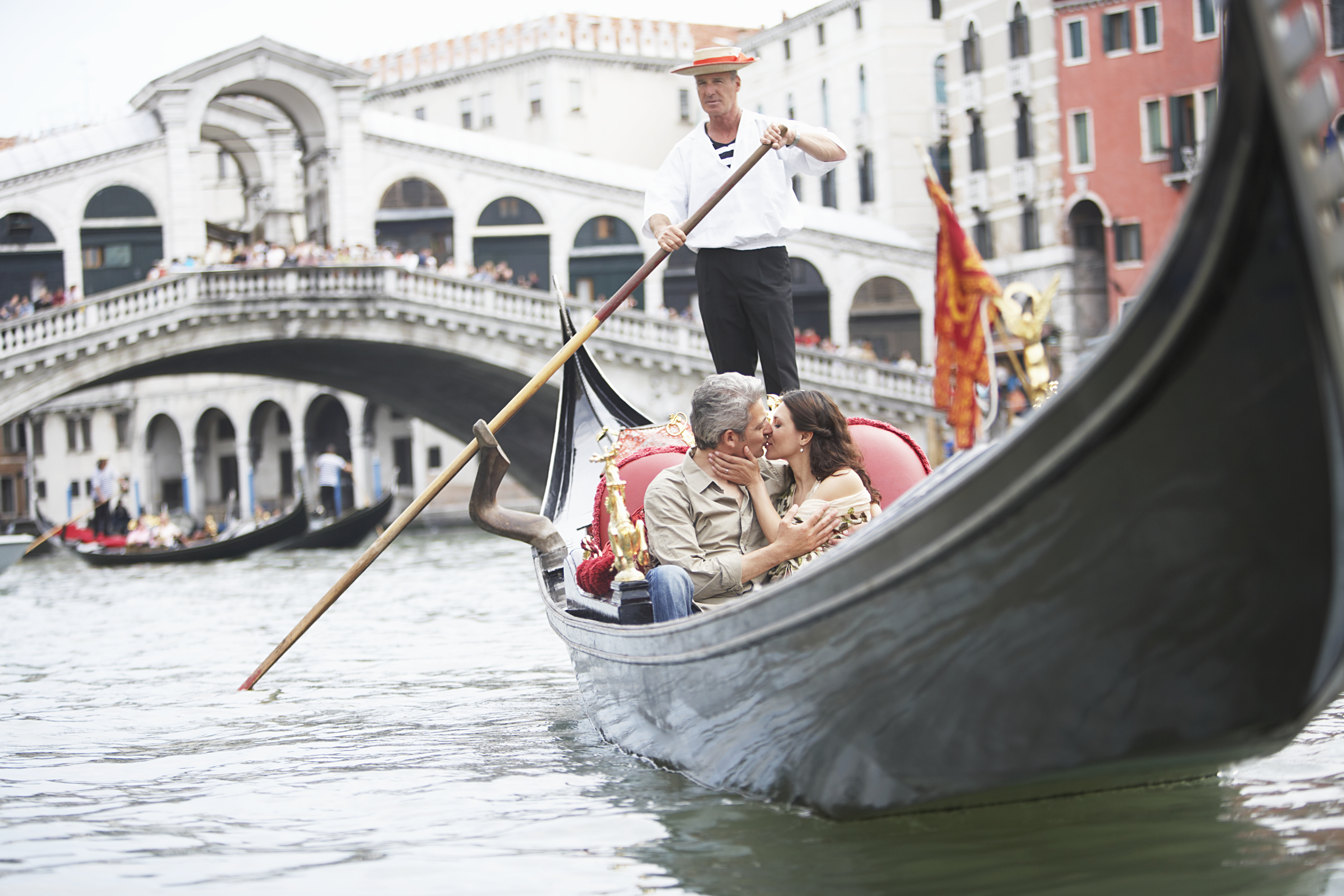 A couple on a boat ride in Venice.