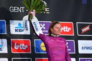 NINOVE BELGIUM FEBRUARY 24 Lotte Kopecky of Belgium and Team SD WorxProtime celebrates at podium as as Pink UCI Womens WorldTour Leader Jersey winner during the 16th Omloop Het Nieuwsblad 2024 Womens Elite a 1271km one day race from Ghent to Ninove UCIWWT on February 24 2024 in Ninove Belgium Photo by Luc ClaessenGetty Images
