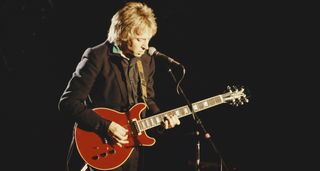 Andy Summers of the Police plays a red Hamer doublecut onstage in the early '80s.