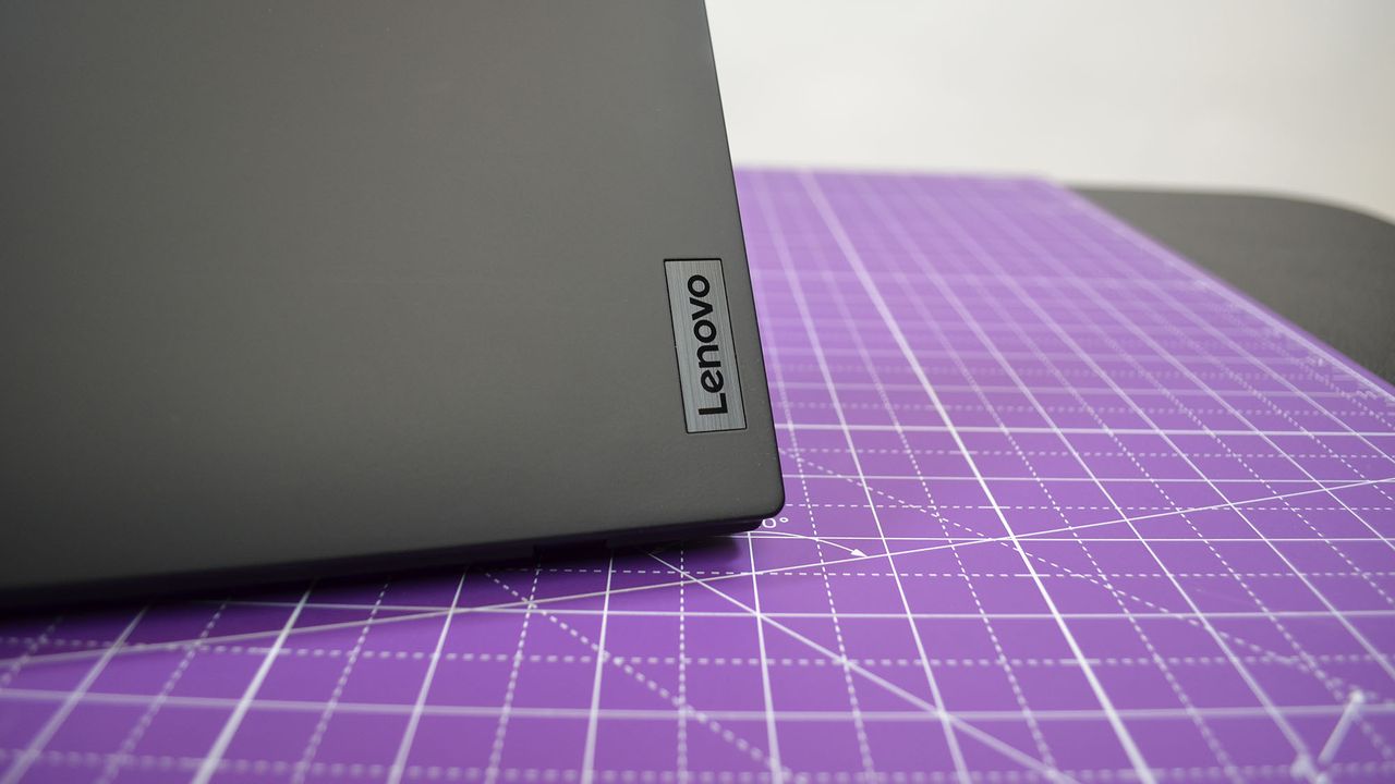 A Lenovo ThinkPad X1 Nano Gen 3 on a desk with a purple desk mat