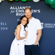 Meghan Markle attends charity tennis tournament wearing a Carolina Herrera shirt dress