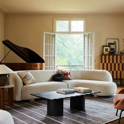 6 easy ways you can use furniture to make a living room look bigger ...