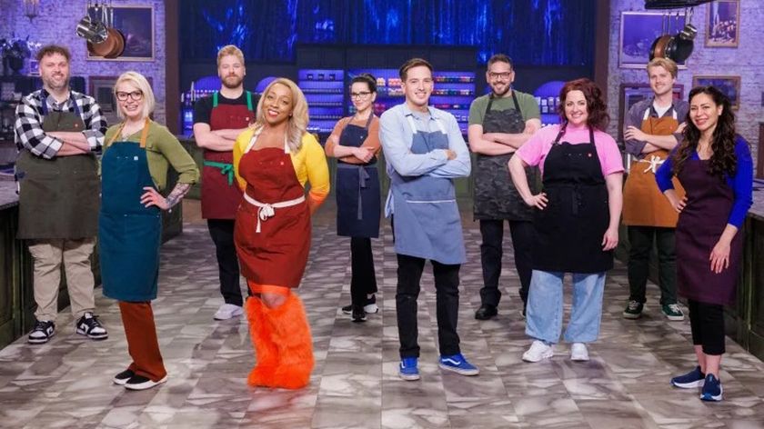 The 10 contestants of the &#039;Halloween Baking Championship&#039; season 11 line up in the kitchen.