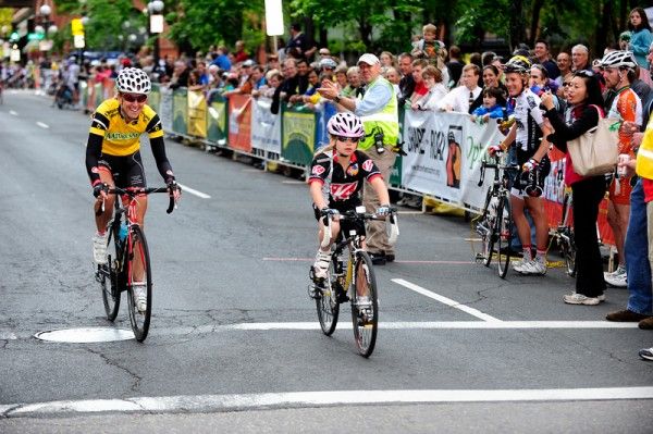 Kristin Armstrong escorts Victoria during the kids fun race