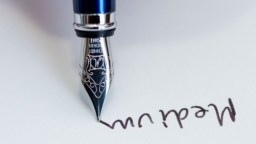 fountain pen and text that says medium (upside down)