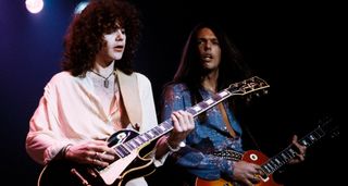Scott Gorham [right] and Brian Robertson of Thin Lizzy, long-haired, playing Les Pauls onstage with the legendary Irish rock institution in 1978