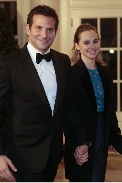 Bradley Cooper and Suki Waterhouse attend the White House State Dinner.