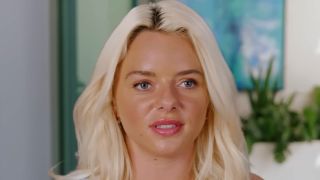 Chloe in her confessional