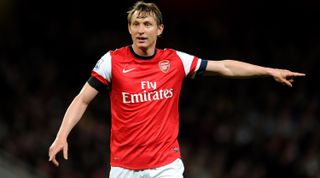 LONDON, ENGLAND - APRIL 15: Kim Kallstrom of Arsenal during the match between Arsenal and West Ham United in the Barclays Premier League at Emirates Stadium on April 15, 2014 in London, England. (Photo by David Price/Arsenal FC via Getty Images)