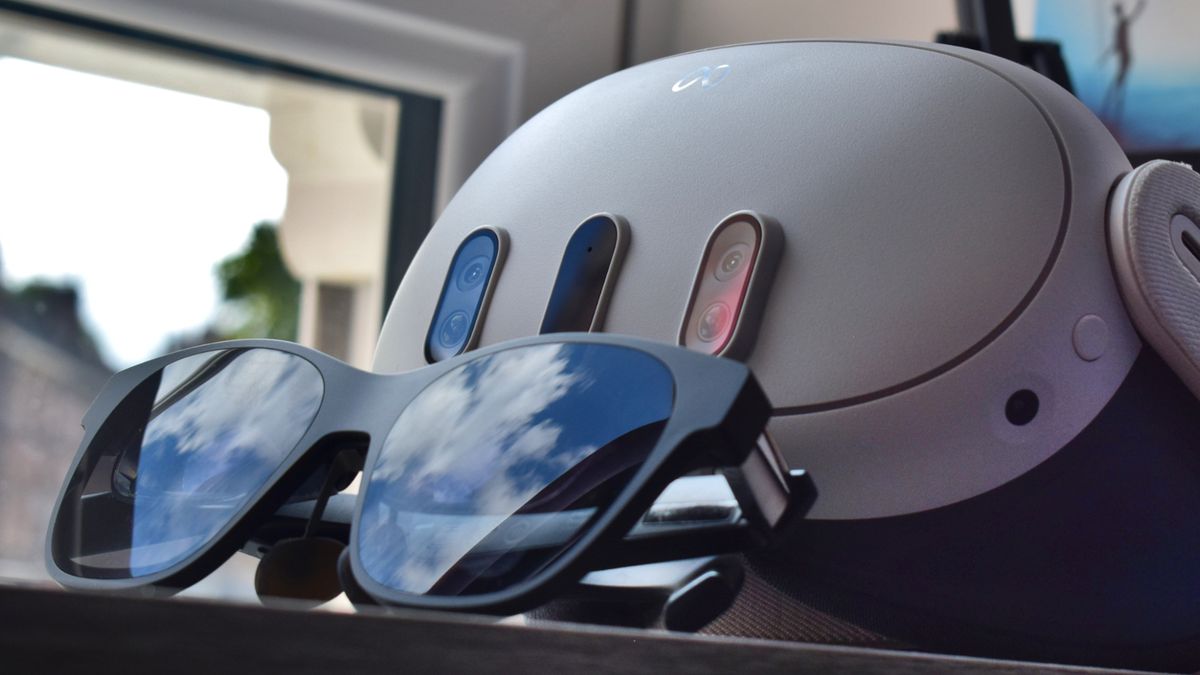 XREAL Air 2 AR Smart Glasses and a Meta Quest 3 VR headset next to one another.