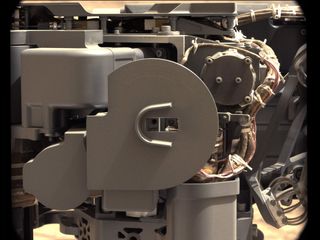 The left Mast Camera (Mastcam) on NASA's Mars rover Curiosity took this image of Curiosity's sample-processing and delivery tool just after the tool delivered a portion of powdered rock into the rover's Sample Analysis at Mars (SAM) instrument. The delivery to SAM and subsequent repositioning of CHIMRA to present this side toward Mastcam, were on Sol 196 (Feb. 23, 2013).
