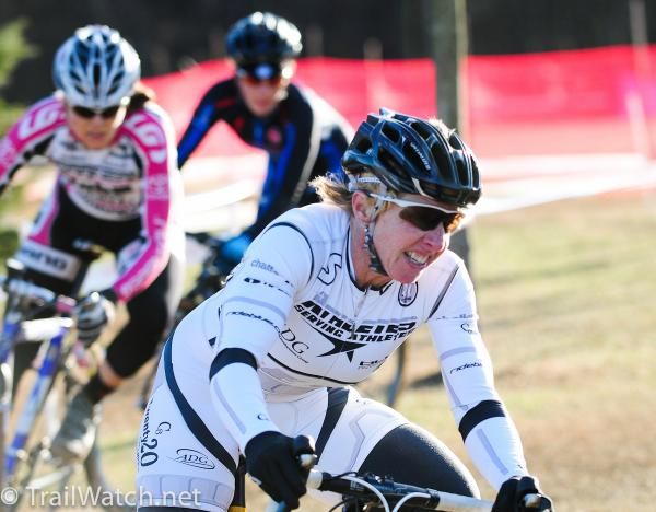 Laura Van Gilder (C3 Athletes Serving Athletes) leads near the barriers mid-race