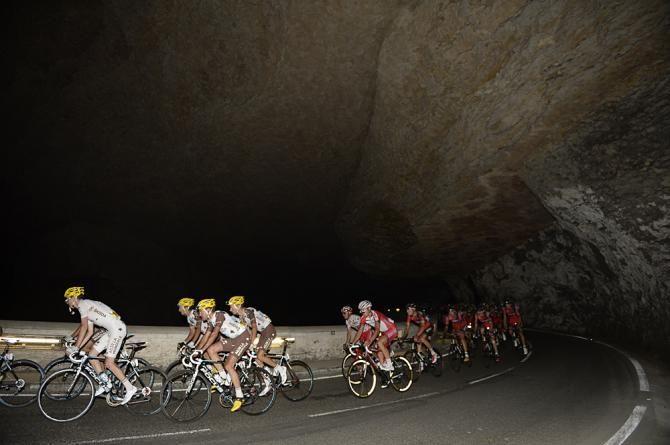 The peloton in a tunnel under the Pyrenees