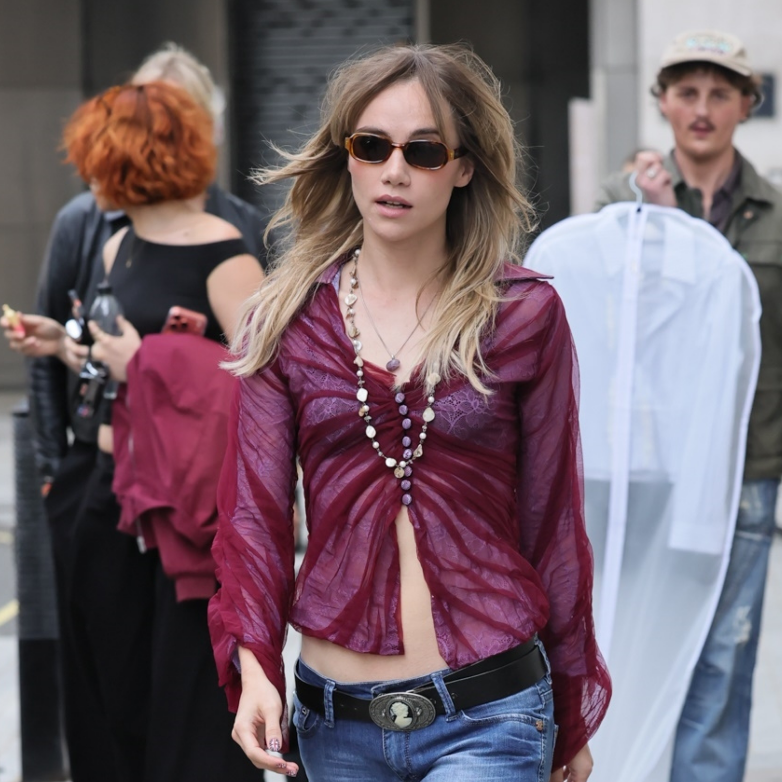 London, UNITED KINGDOM British singer-songwriter and actress Suki Waterhouse looks sensational wearing a sheer top showing off her washboard abs and skinny jeans. Rounded off with Union Jack finger Nails and Queen Elizabeth belt, Suki was promoting new music at BBC Radio One. Pictured: Suki Waterhouse BACKGRID USA 15 JUNE 2026 BYLINE MUST READ: Mattpapz / BACKGRID USA: +1 310 798 9111 / usasales@backgrid.com 
