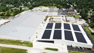 An aerial view of a Draper building powered by solar panels. 