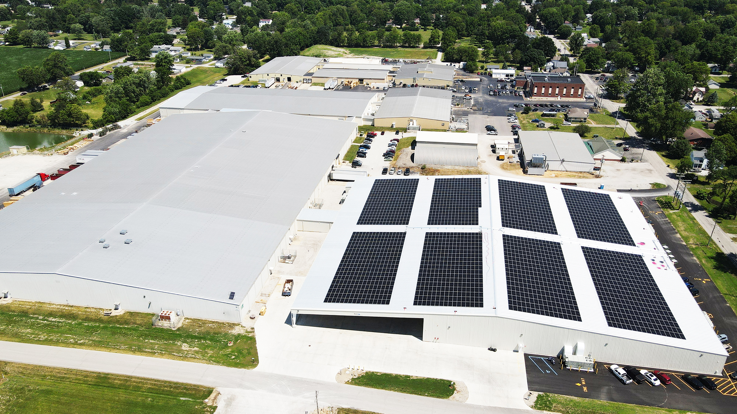 An aerial view of a Draper building powered by solar panels. 