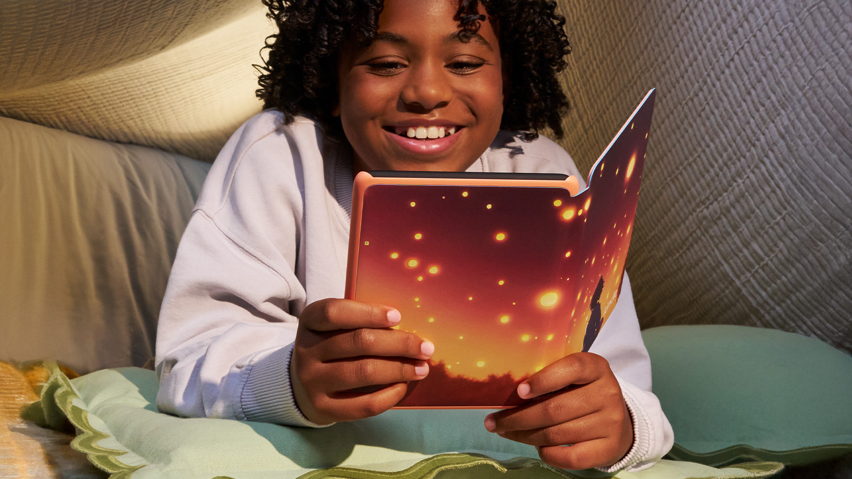 Amazon Kindle Colorsoft for Kids being read by a young girl
