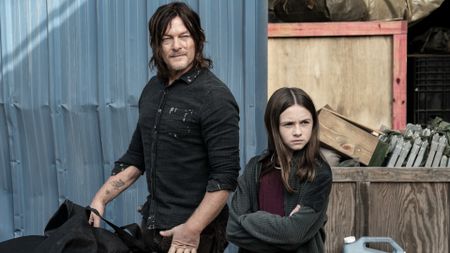 Norman Reedus as Daryl Dixon and Cailey Fleming as Judith Grimes in The Walking Dead season 11, episode 18