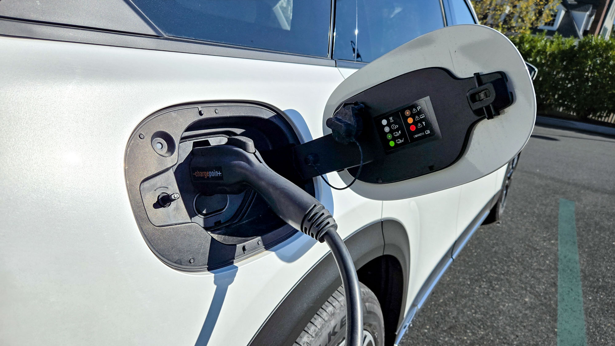 2024 Mazda CX-90 PHEV Premium Plus plugged into a charger.