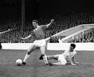 Dennis Viollet in action for Manchester United against Manchester City in September 1959.