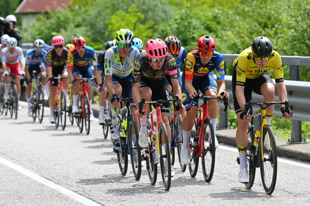 SAPPADA ITALY MAY 24 LR Dries De Pooter of Belgium and Team Intermarche Wanty Mikkel Frolich Honore of Denmark and Team EF Education EasyPost Edward Theuns of Belgium and Team Lidl Trek and Tim van Dijke of Netherlands and Team Visma Lease a Bike compete in the breakaway during the 107th Giro dItalia 2024 Stage 19 a 157km stage from Mortegliano to Sappada 1236m UCIWT on May 24 2024 in Sappada Italy Photo by Dario BelingheriGetty Images