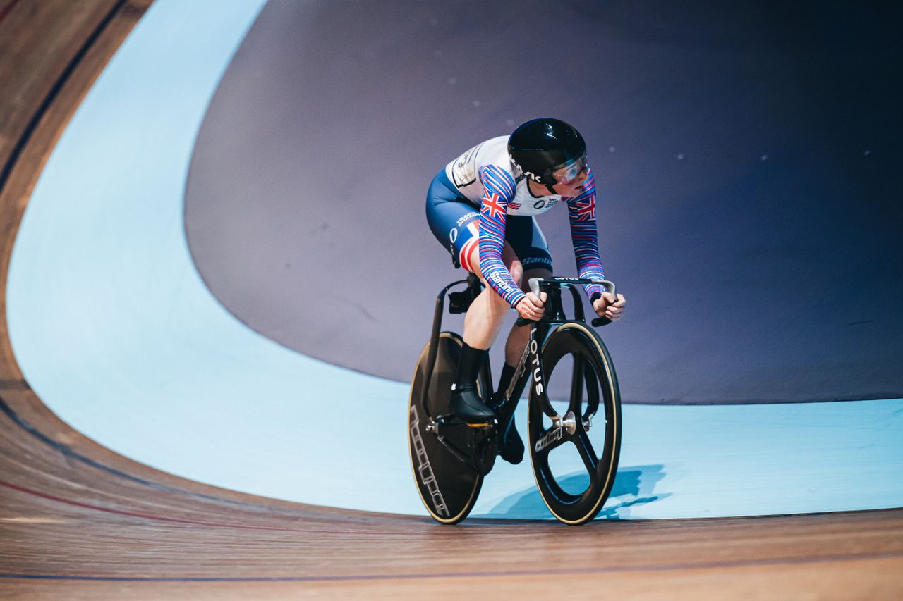 Katie Archibald riding alone on the track 