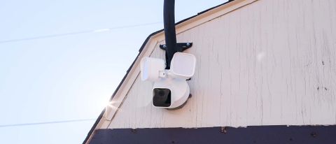 Blink Wired Floodlight Camera attached to side of house