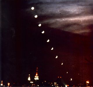 Night Sky columnist, Joe Rao, took this composite photo of the Dec. 30, 1982, total lunar eclipse. The 1982 eclipse could be similar to the Oct. 8, 2014, eclipse. The images of the eclipse were shot from Jones Beach West End Field #2. The next night, Rao imaged the NYC skyline from Ferry Point Park in the Bronx.