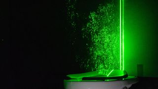Scientists used green lasers to illuminate the normally invisible aerosol plumes that shoot out of uncovered toilets when flushed.
