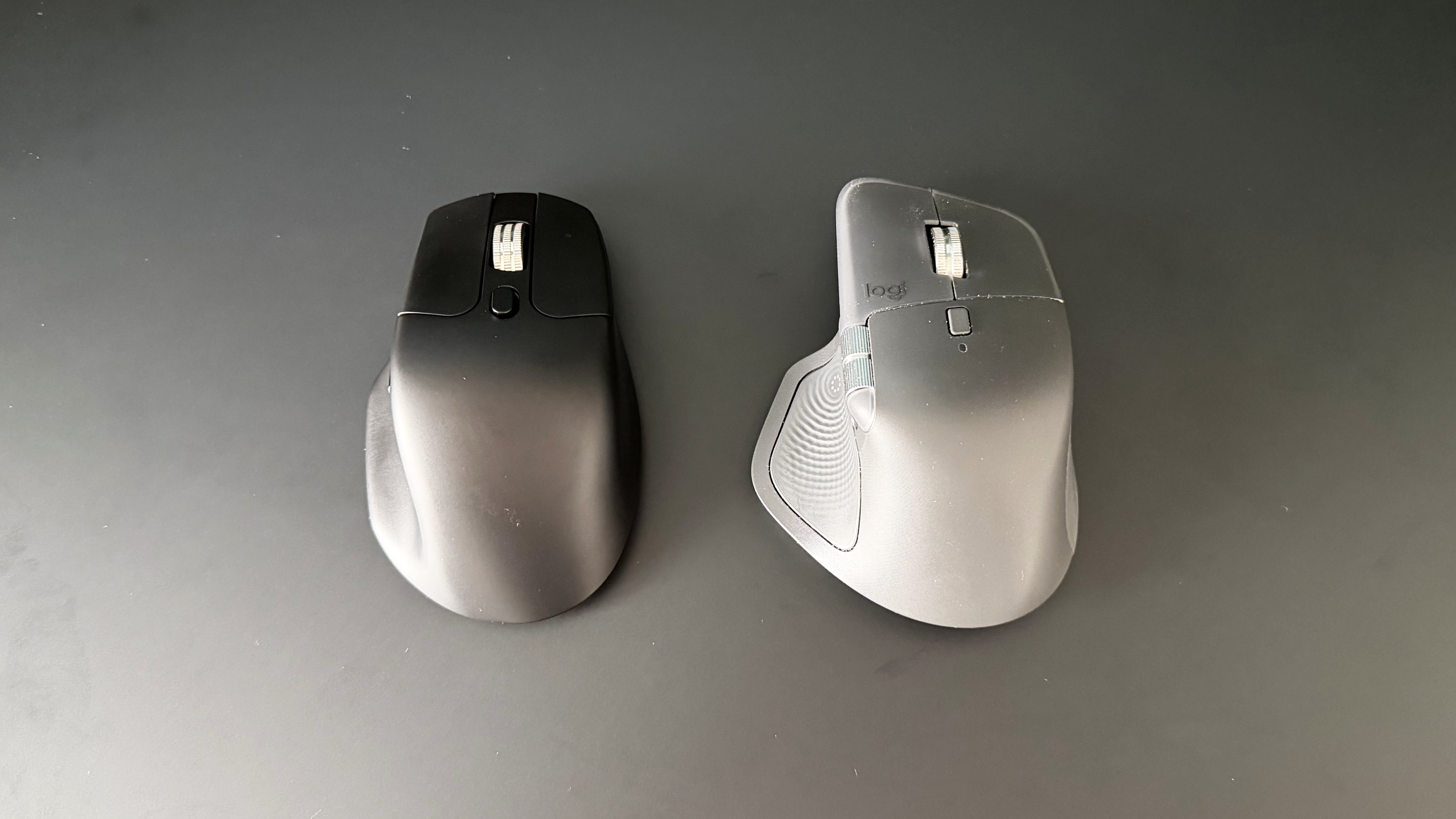 The Keychron M6 8K on the left and the Logitech MX Master 4 on the right.