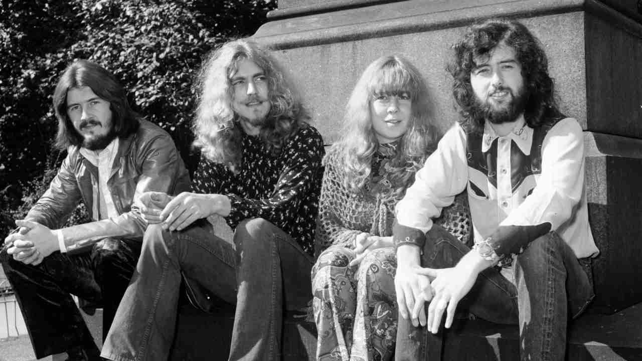 Sandy Denny posing for a photograph with Led Zeppelin in the 1970s
