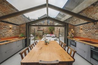 kitchen extension with a glass room and view to courtyard