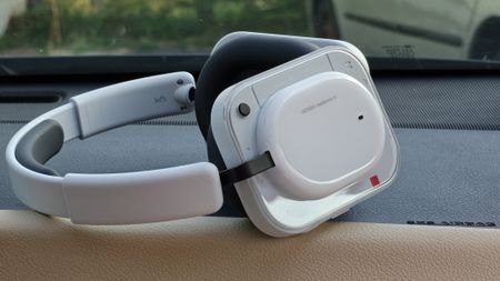 A pair of white Nothing Headphones (a)