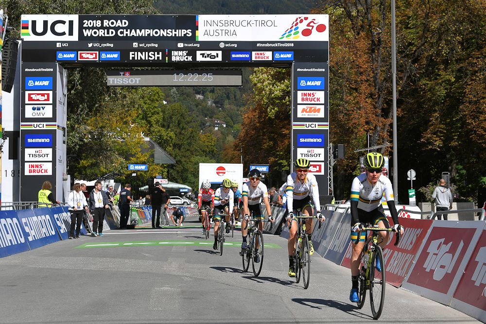 Amanda Spratt and Lucy Kennedy of Australia ride through the finish line