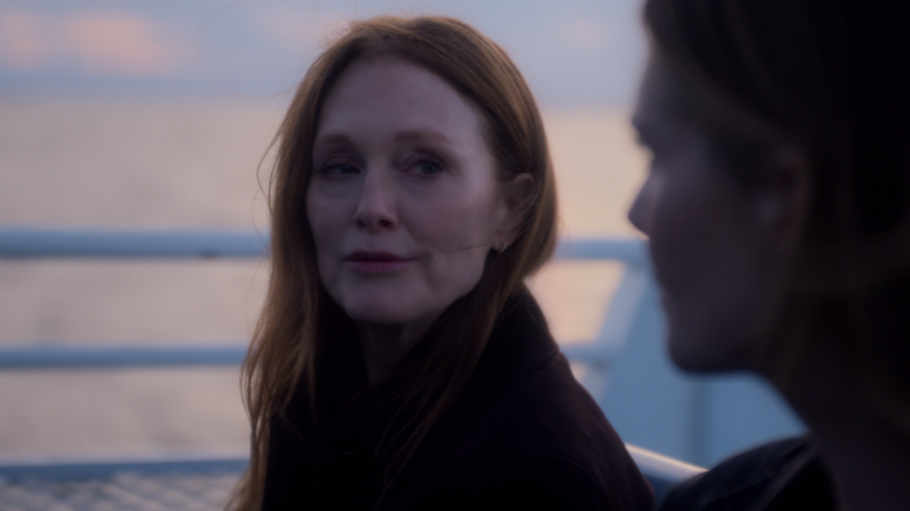 Julianne Moore looking at Meghann Fahy on ferry in Sirens finale