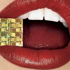 red lips biting computer chip