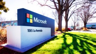 Mountain View, USA - March 4, 2015: Microsoft Silicon Valley campus entrance sign with a parking and some buildings in the background. Back lit by morning Winter light creating long shadows from the trees onto the lawn. The 1065 La Avenida address is clearly visible.