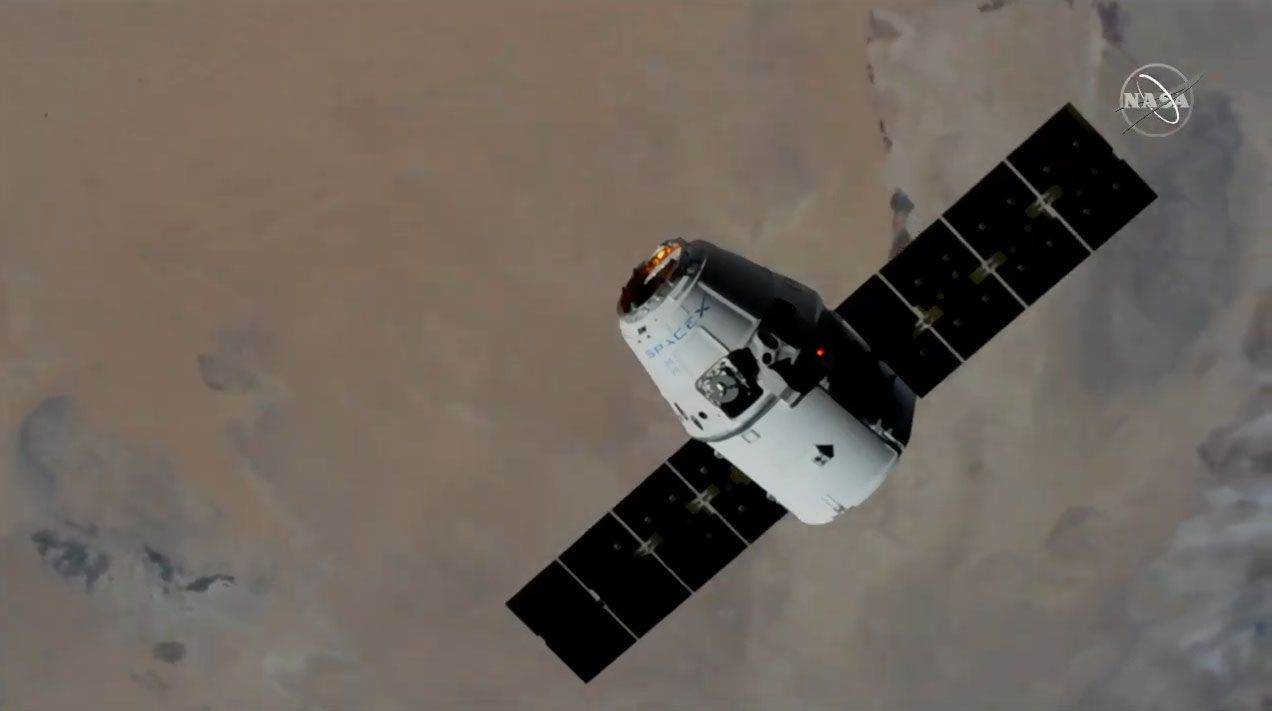 A SpaceX Dragon cargo ship carrying over 5,700 lbs. (2,585 kilograms) of science gear and NASA supplies arrives at the International Space Station on Dec. 8, 2019 during the CRS-19 cargo mission.