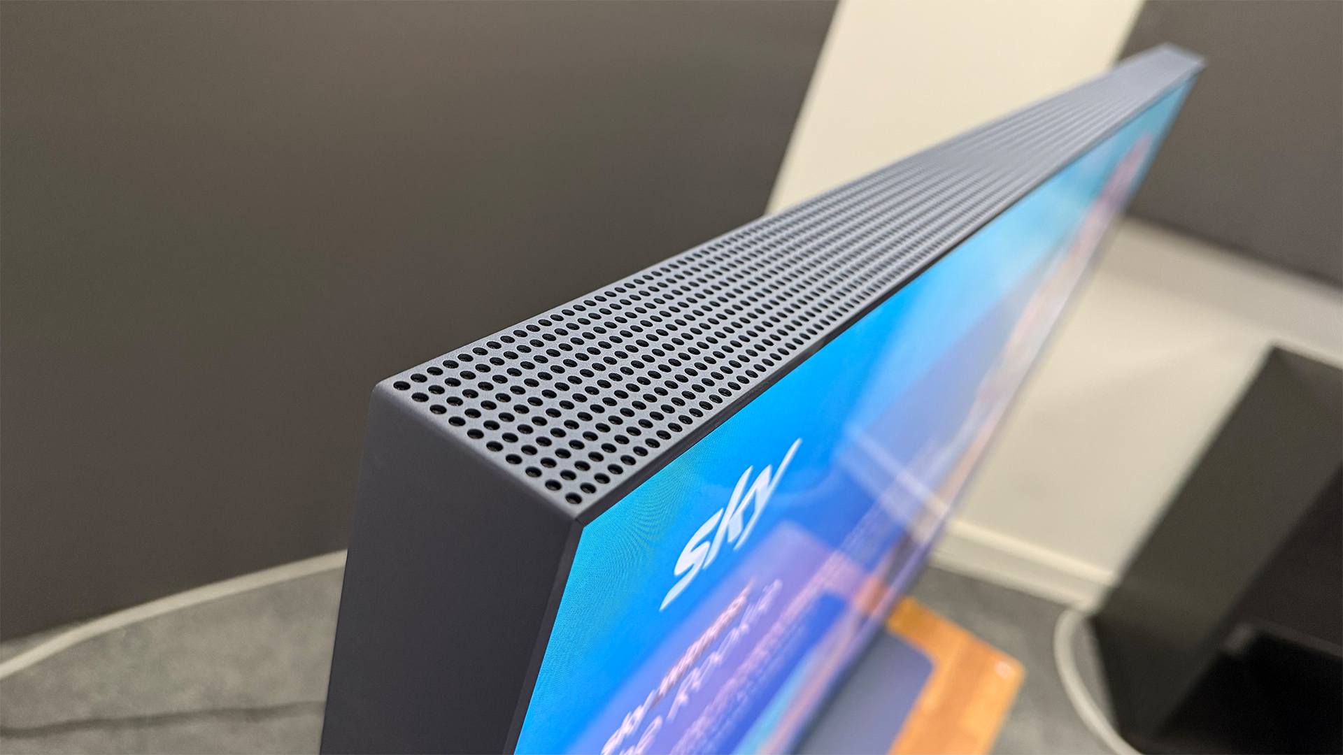 Sky Glass Gen 2 TV, soundbar and streaming service top down view of TV set with Sky on screen