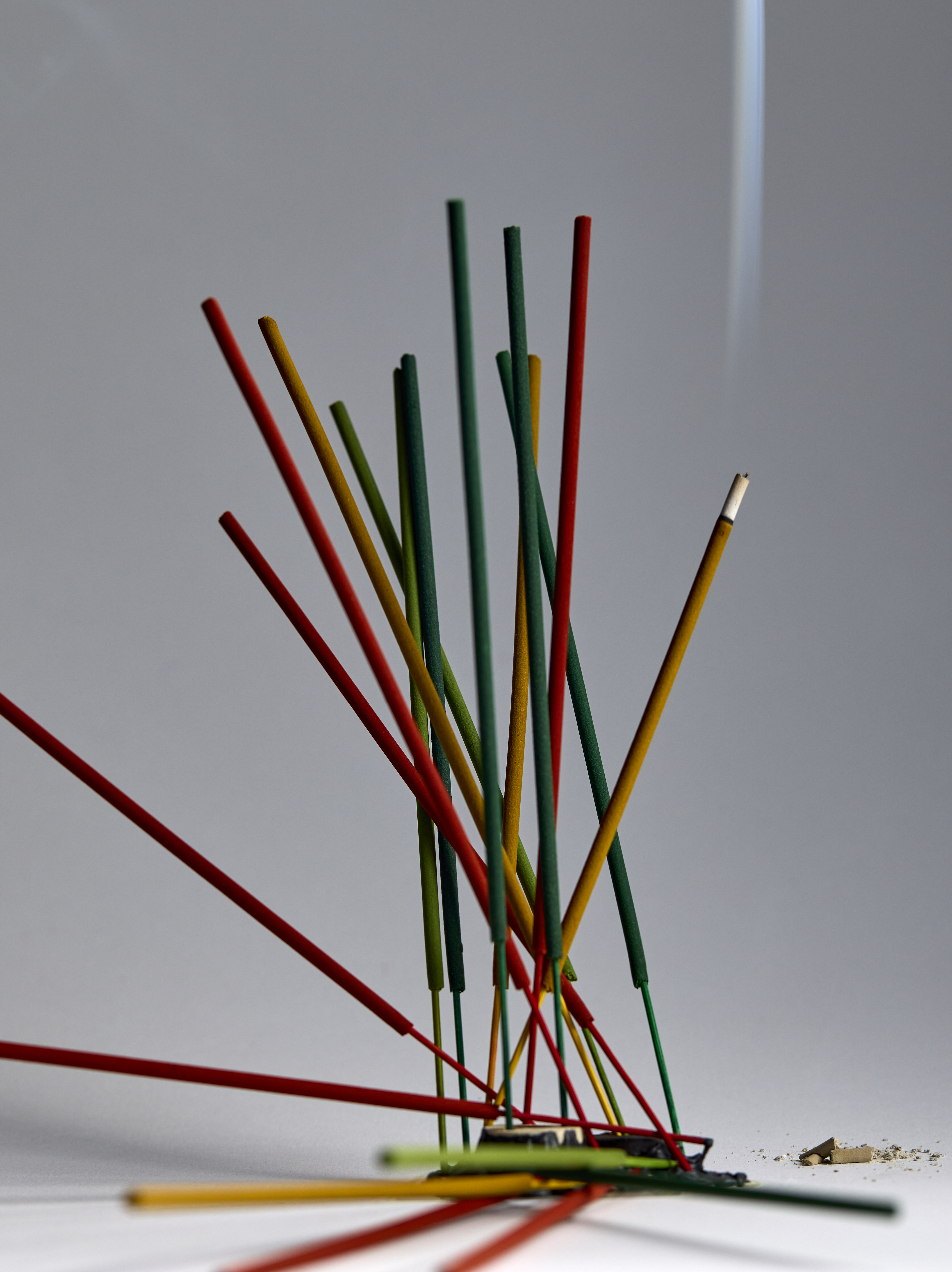 A picture of colourful incense sticks