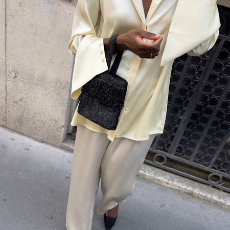 An image of a woman wearing minimalist fall outfit idea 2026