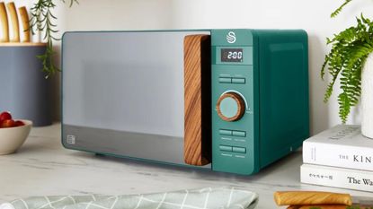 Picture of white swan nordic microwave on kitchen counter