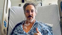 Ryan Hamilton in a hospital bed