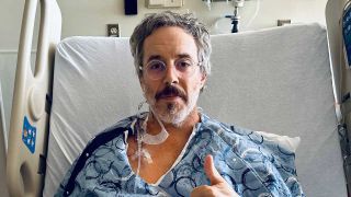 Ryan Hamilton in a hospital bed