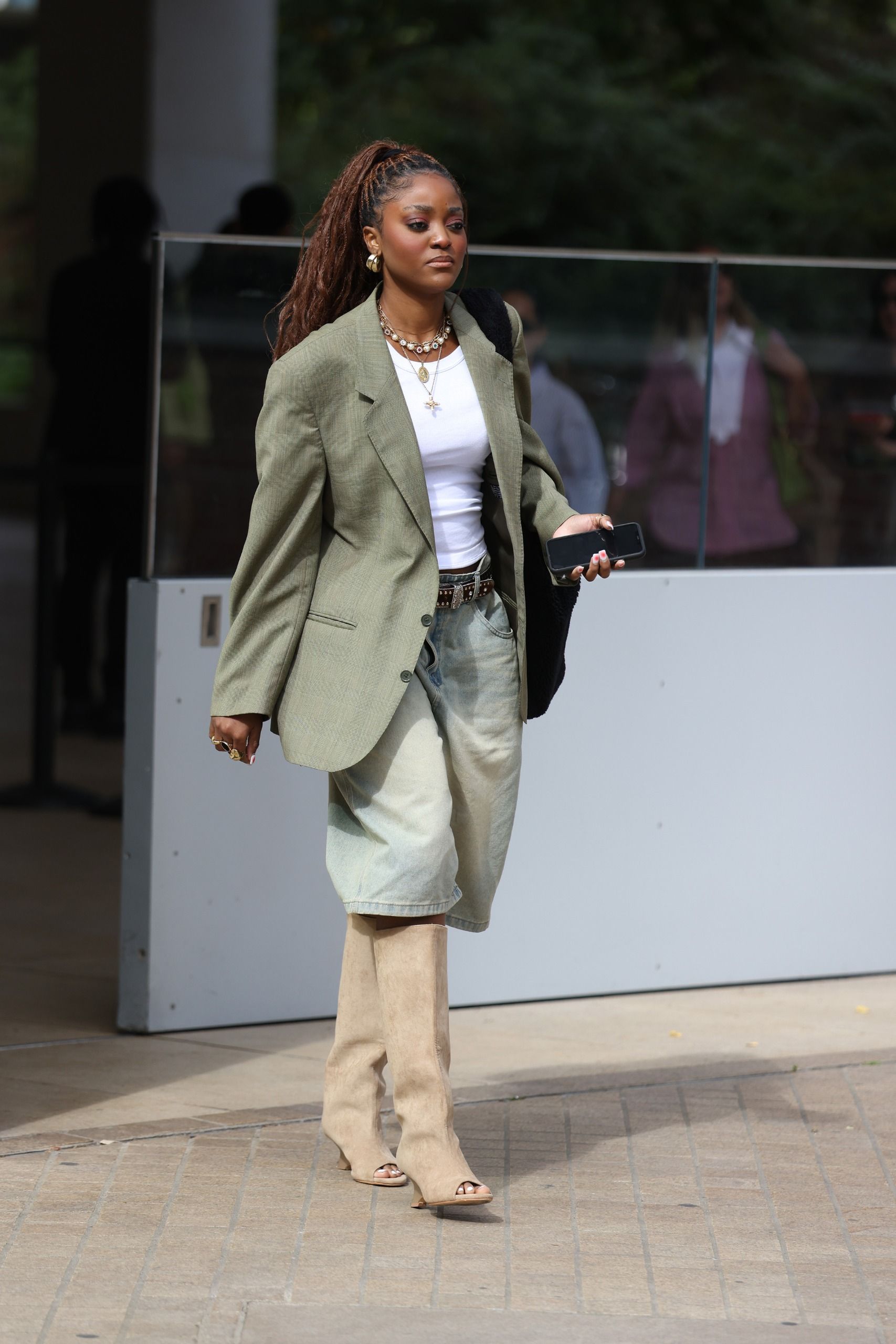 A guest wore the peep-toe boots trend at London Fashion Week 2026