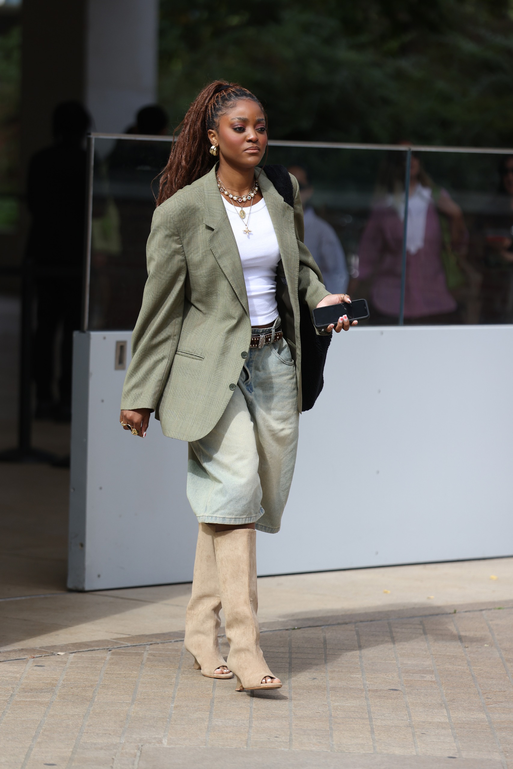 A guest wore the peep-toe boots trend at London Fashion Week 2026