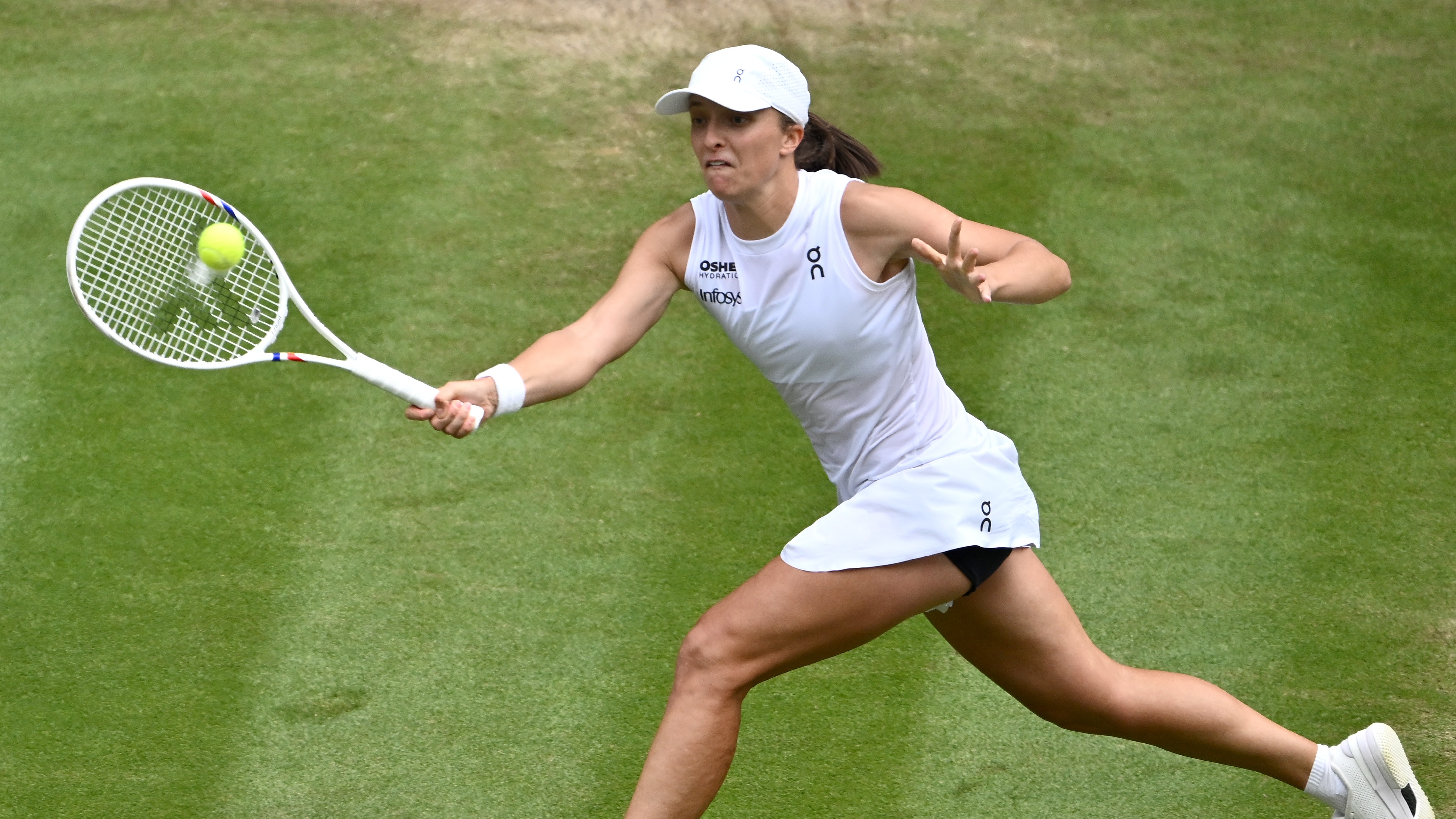 Iga Swiatek playing in the Wimbledon women&#039;s semi-final