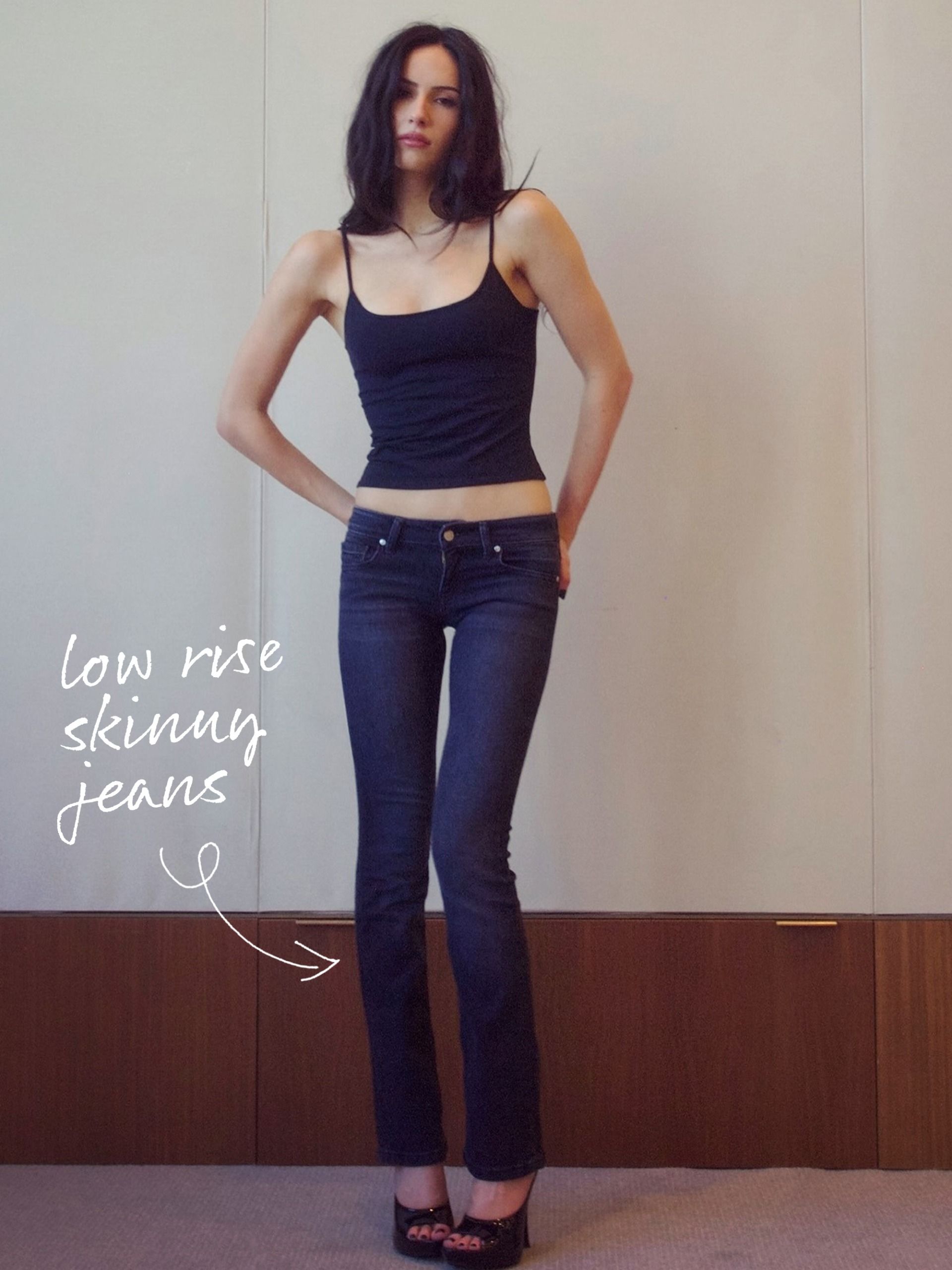 Gen Z fashion person wearing low-rise skinny jeans.